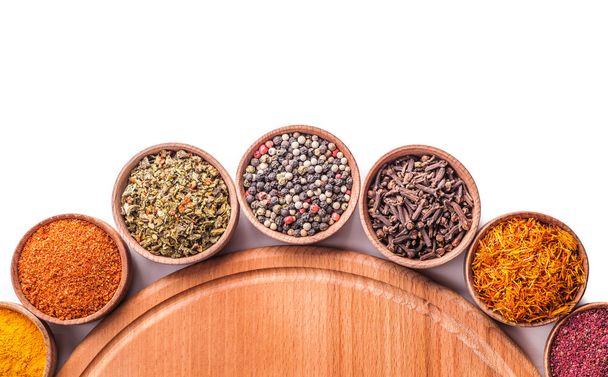 set spices in a wooden bowl  - Foto, afbeelding