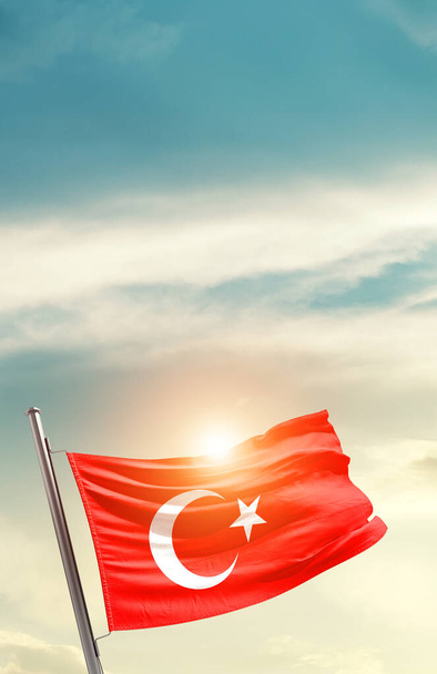 Turkey waving flag in beautiful sky with sun - Fotó, kép
