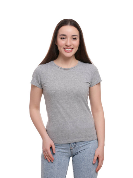 Woman wearing stylish gray T-shirt on white background - Photo, Image