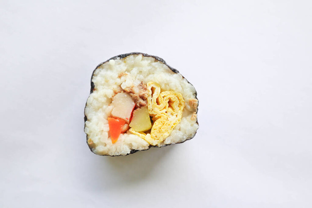 kimbap or gimbap is Korean roll Gimbap(kimbob) made from steamed white rice (bap) and various other ingredients. isolated on white background - Photo, Image
