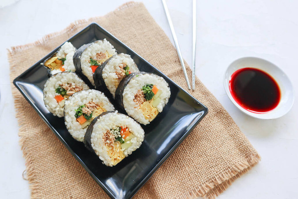 kimbap or gimbap is Korean roll Gimbap(kimbob) made from steamed white rice (bap) and various other ingredients, this food from south korea - Photo, Image