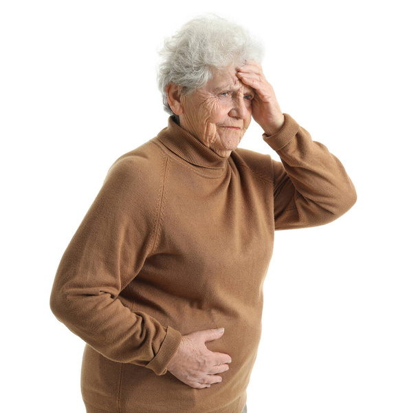 Donna anziana con appendicite su sfondo bianco - Foto, immagini