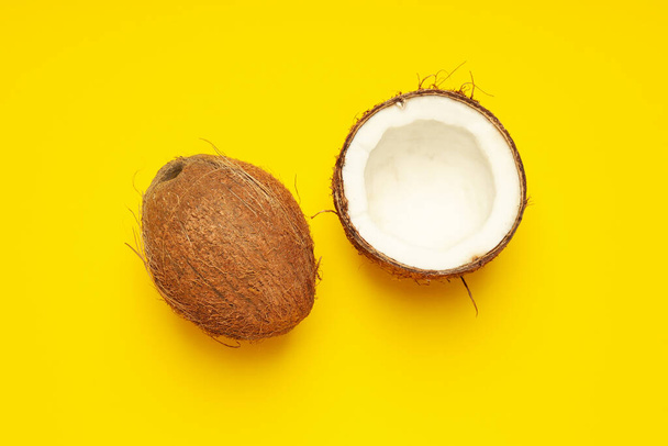 Composition for summer concept with coconut on yellow background - Foto, Bild