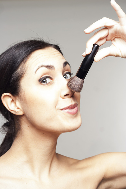 Woman with make up brush - Foto, immagini