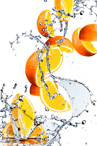 Orange fruits and Splashing water - Фото, изображение