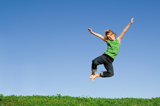 Fit healthy active happy smiling child, jumping for joy - Foto, Bild