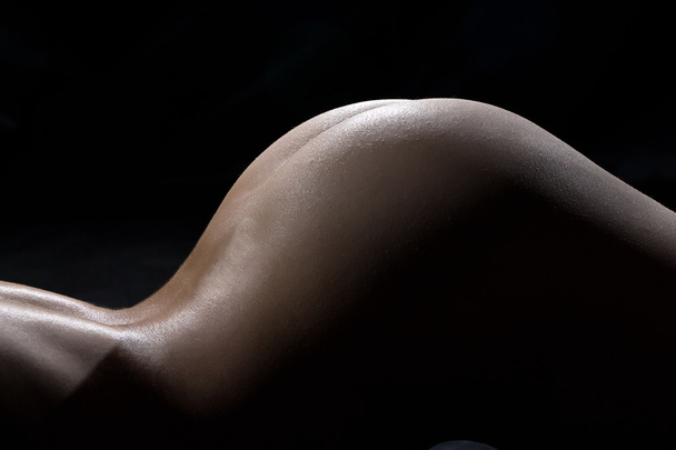 Image of the womans sexy buttocks - Foto, immagini