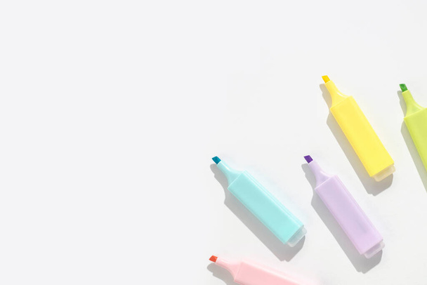 Colored markers on a white background. Top view; flat lay. - Photo, Image