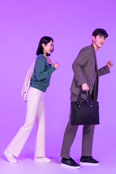 business working concept, young Korean Asian woman and man, leaving work at time - Valokuva, kuva