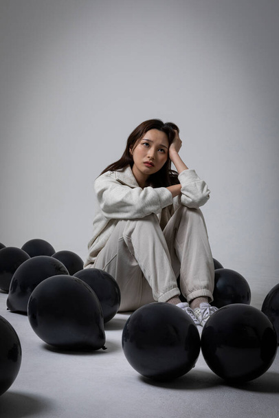 stressed, depressed Korean business woman in pink suit, frustrated - Foto, Imagem