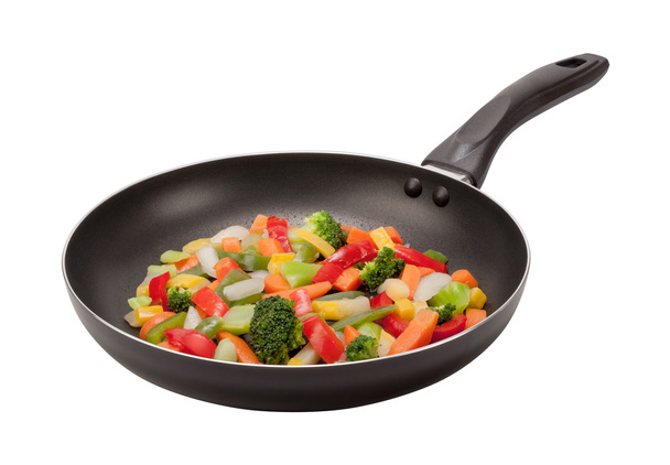 размешать овощи на сковороде - Фото, изображение