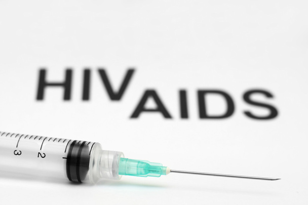Σύριγγα για τον Hiv - aids φόντο - Φωτογραφία, εικόνα