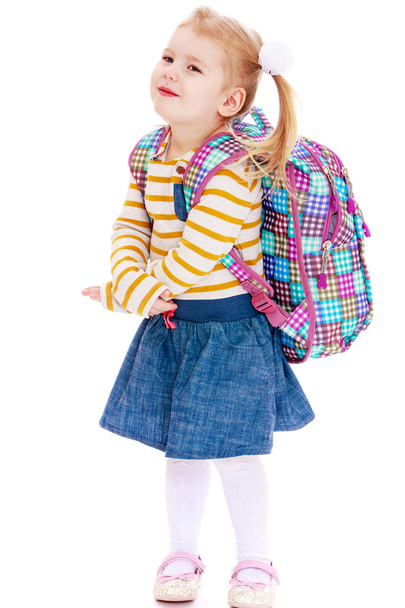 beautiful blonde girl schoolgirl with satchel up behind - Photo, Image
