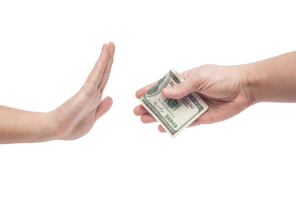man weigeren geld aangeboden door man geïsoleerd op witte achtergrondkleur - Foto, afbeelding