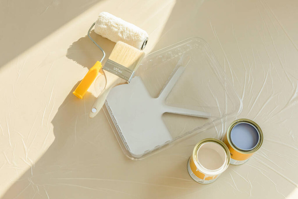 DIY interior hand motion, closeup_paint and paint tools - Photo, Image