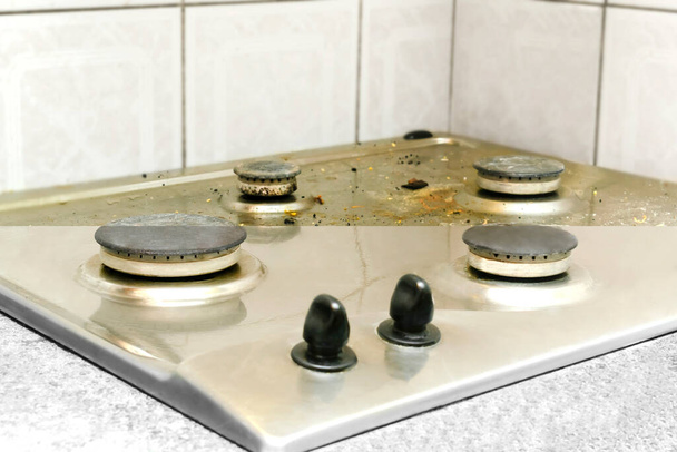 Collage of cleaning dirty and clean gas stove from grease, food leftovers bits of food before - after washing.kitchen stove. House home domestic cleaning service concept,chores,housework. - Foto, imagen