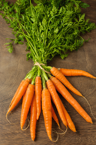 Fresh carrots on wooden table - Photo, Image