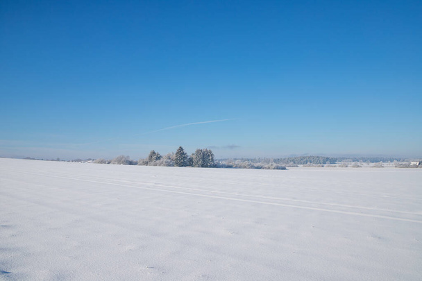 Panorama snow landscape with tracks and blue sky. High quality photo - Foto, immagini