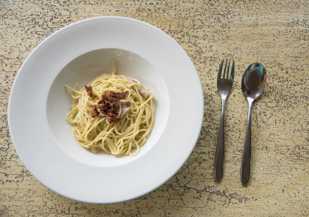 Spaghetti with becon on table, Cuisine - Φωτογραφία, εικόνα