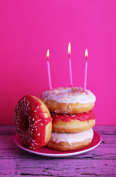 Delicious donuts with birthday candles - Φωτογραφία, εικόνα