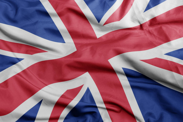 Büyük Britanya bayrağını sallıyor. Makro atış. 3B illüstrasyon - Fotoğraf, Görsel
