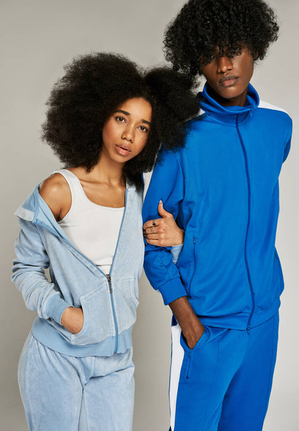 African american couple stylized for the 90s with afro hairstyle isolated on gray background - Foto, immagini