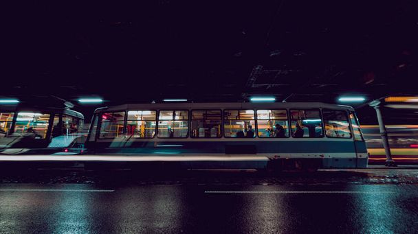 tram at night under the bridge - Valokuva, kuva