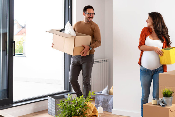 young couple, future parents in new flat - Foto, imagen