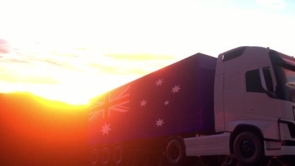 Avustralya bayrağı taşıyan yük kamyonları. Avustralya 'dan gelen kamyonlar depo rıhtımında yükleme veya boşaltma yapıyor. - Video, Çekim