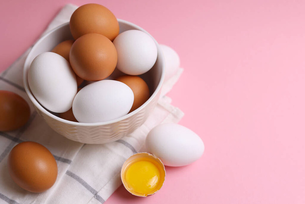 fresh farm eggs on a colored background. High quality photo - Фото, изображение