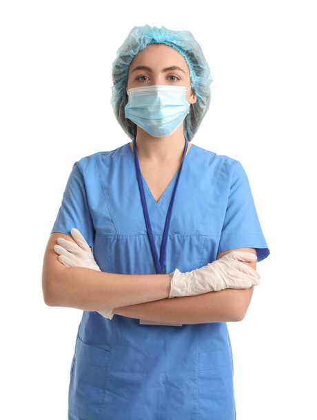 白い背景の医療マスクの女性看護師 - 写真・画像