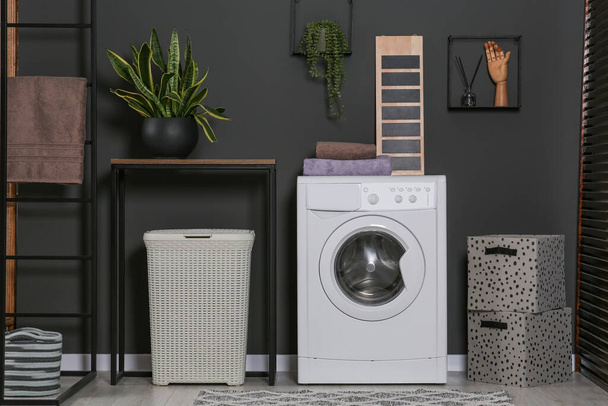 Stylish laundry room with washing machine. Interior design - Фото, изображение