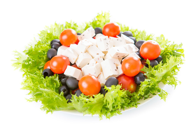 Griekse salade eten - Foto, afbeelding
