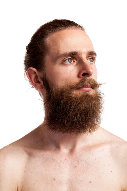 Cool hipster with long beard over white background in studio photo - Photo, Image