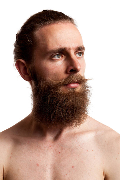 Cool hipster with long beard over white background in studio photo - Photo, Image