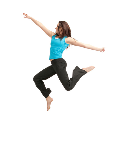 Jumping sporty girl - Фото, зображення