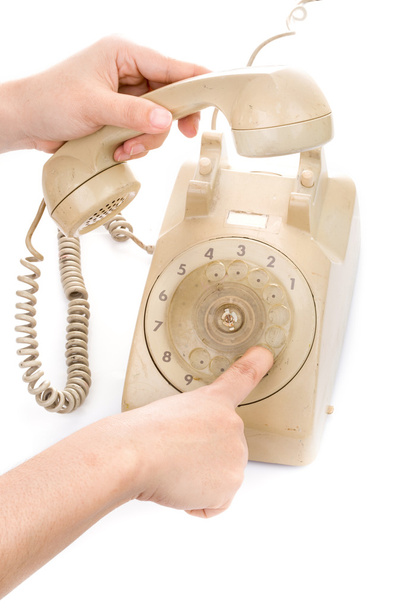 Hand hold vintage telephone cream color  - Photo, Image