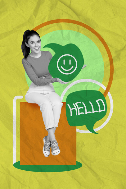 Vertical collage image of cheerful black white effect girl arms hold smiley emoji dialogue bubble say hello isolated on lime background. - Фото, зображення