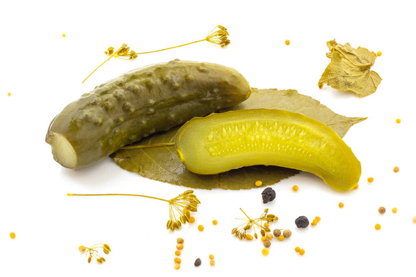 Pickled cucumbers with seasoning on a white isolated background - Photo, Image