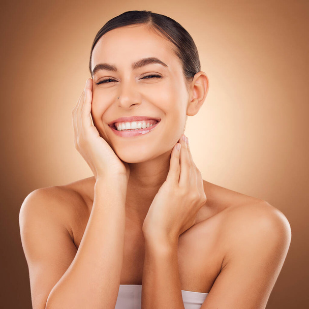 Beauty satisfaction, face portrait and happy woman with luxury facial cosmetics, natural makeup and studio skincare glow. Dermatology, spa salon person and aesthetic female model on brown background. - 写真・画像