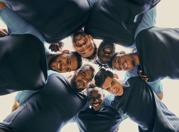 Low angle, fitness or rugby team in huddle with support or solidarity for competition, training game. Men group, happy smile or athletes in sports match or exercise together with pride or mission. - Photo, Image