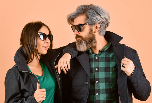 Outdoor Autumn outfit. stylish couple of models in autumn outfits posing. Fashion couple in love. Enjoying autumn time together. fashionable couple posing in street. trendy couple in sunglasses. - Φωτογραφία, εικόνα
