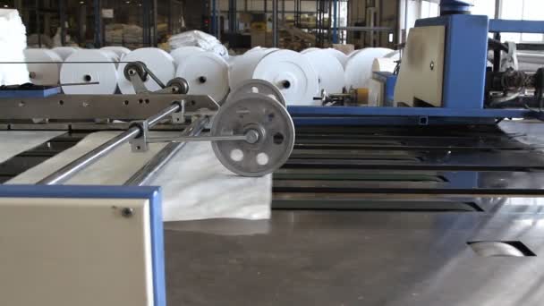 Big polymeric tape roll unreel for a printing press - Footage, Video