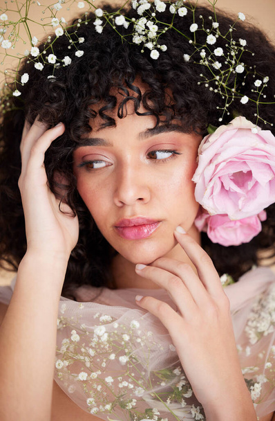 Flowers, beauty and face of woman with cosmetics, makeup and hair care for wellness, glamour and glow. Spring aesthetic, spa and girl with fabric for natural, skincare and facial treatment in studio. - Foto, Imagem