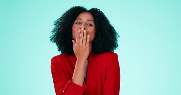 Face, black woman and blowing kiss on background for love, care and flirting lips on color backdrop in studio. Portrait of female model, hand kisses and expression of happiness, romance and emoji. - Footage, Video