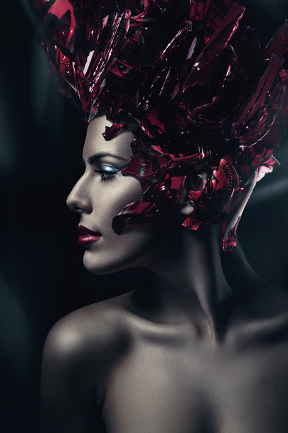 Woman with red glass hat - 写真・画像