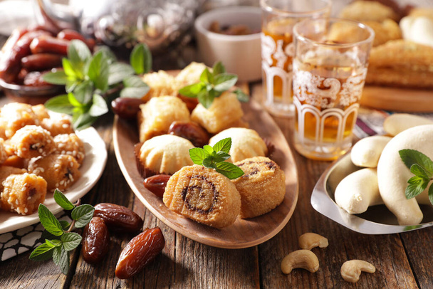 Ramadan food- pastry,  dried dates and mint tea - Fotó, kép