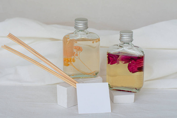 Diffuser bottles with sticks isolated on white background  - Φωτογραφία, εικόνα