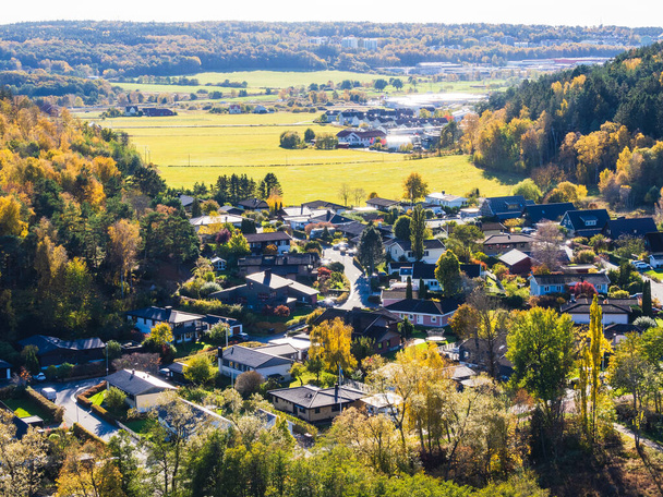 A stunning high angle view of the Molndal neighbourhood in Sweden, showcasing the vibrant cityscape and residential area surrounded by built structures. - Zdjęcie, obraz