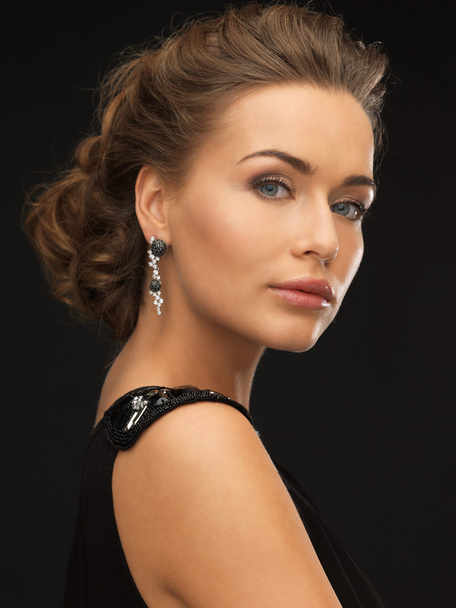woman with diamond earrings - Foto, Imagen